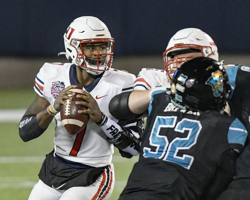 Willis leads Liberty to Cure Bowl victory in record breaking day