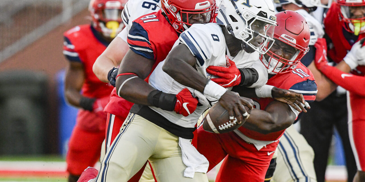 Punting, defense helps carry Liberty to 21-12 win against Akron