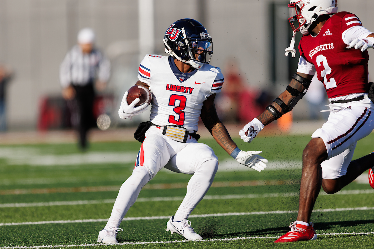 Liberty uses strong 2nd quarter to seize control in 42-24 win at UMass