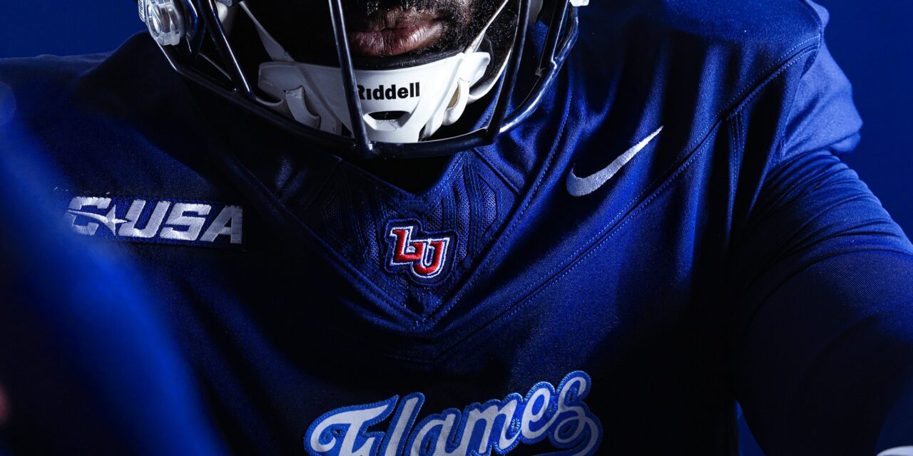 Liberty football debuts new navy uniforms